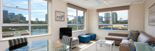 Two Bedroom Lounge with Harbour View - Harbourside Apartments Sydney